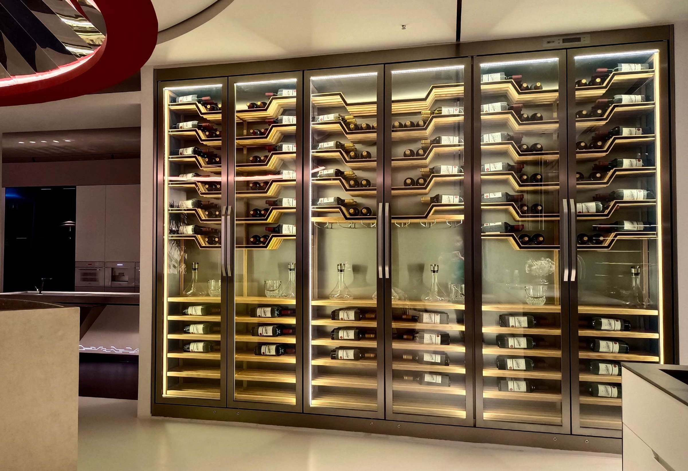 Custom illuminated glass wine cabinet wall
