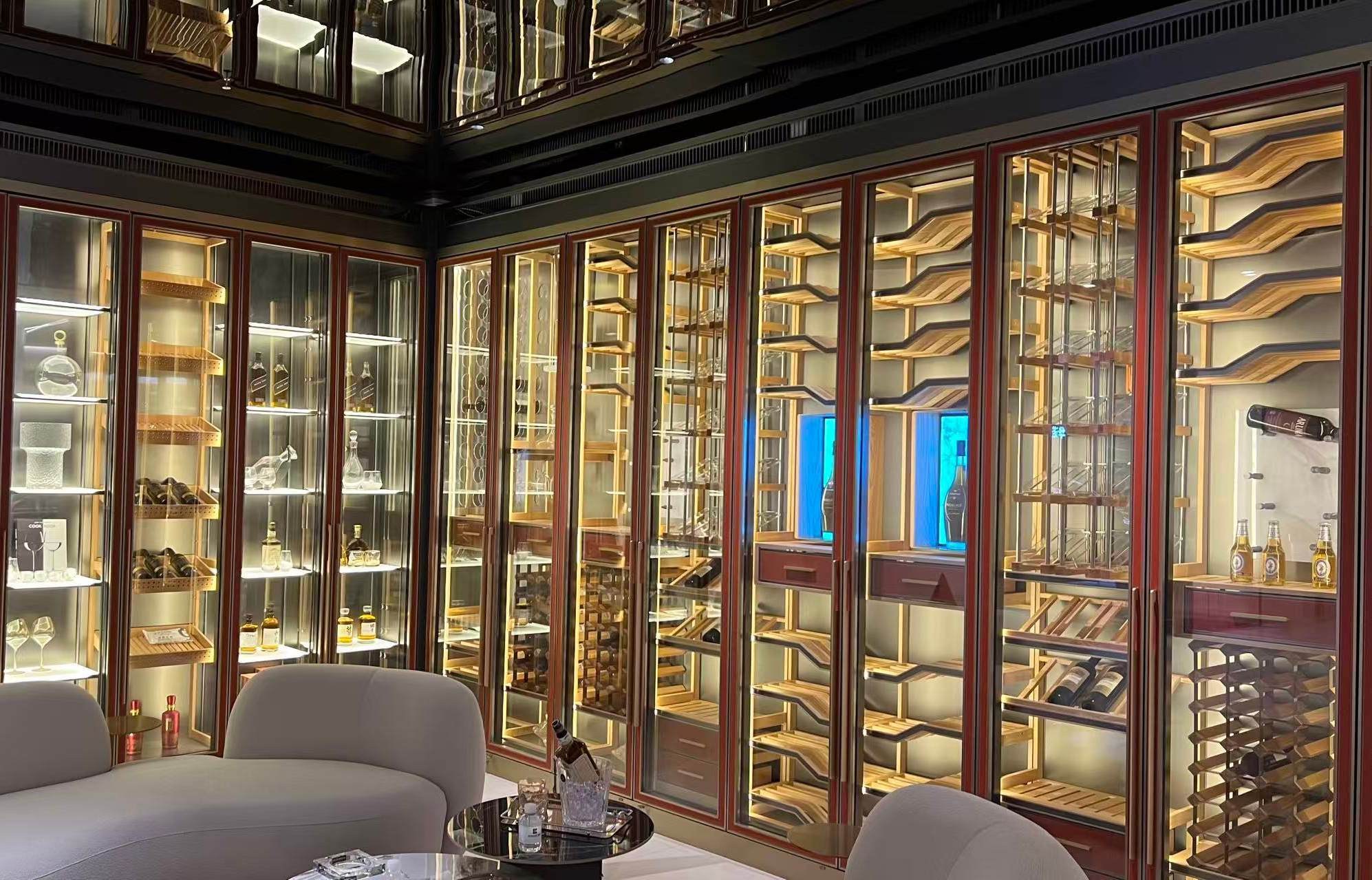 Hospitality wine wall with champagne gold framing